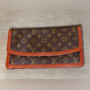 Louis Vuitton Pochette Dame Clutch GM
Brown Leather